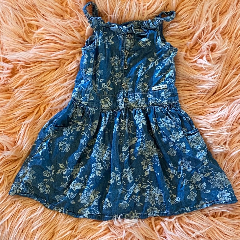 Calvin Klein girls denim dress with flowers.